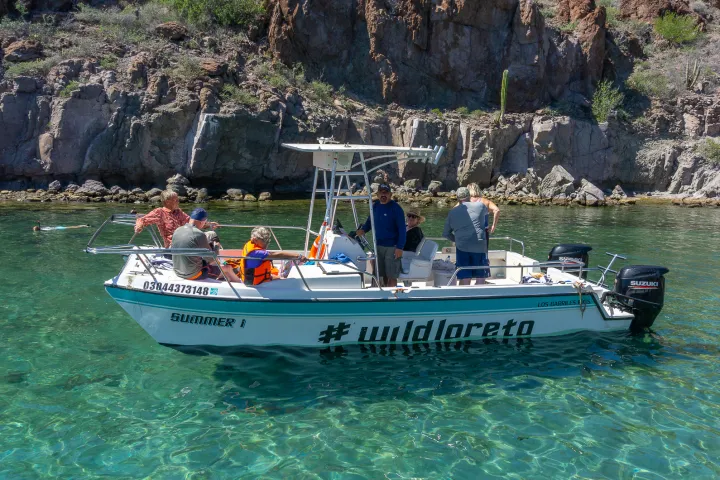 a small boat in a body of water