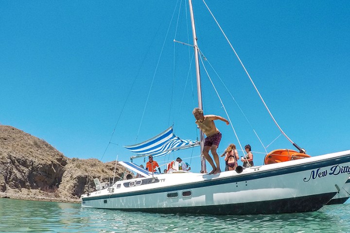 a small boat in a body of water